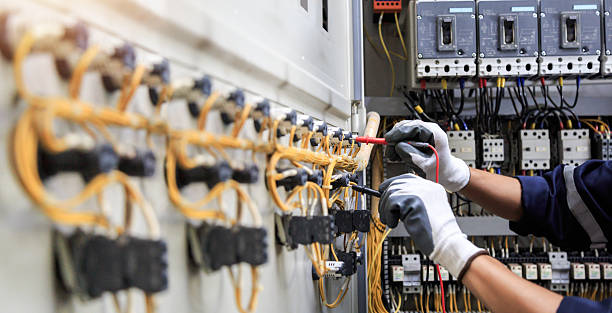 Professional Electrician technician working in Versailles, MO